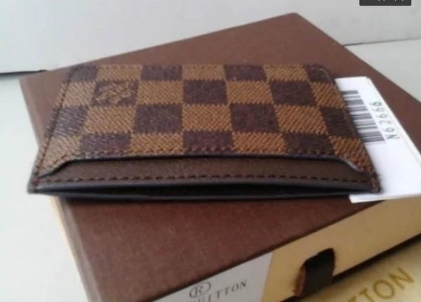 2020 new mens fashion classic design casual credit card id holder real leather ultra slim wallet packet bag for mens/womens 606 
2020 new mens fashion classic design casual credit card id holder real leather ultra slim wallet packet bag for mens/womens 606