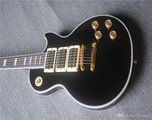 electric guitar, black paint, 3 pickups, gold accessories, customizable electric guitar
electric guitar, black paint, 3 pickups, gold accessories, customizable electric guitar