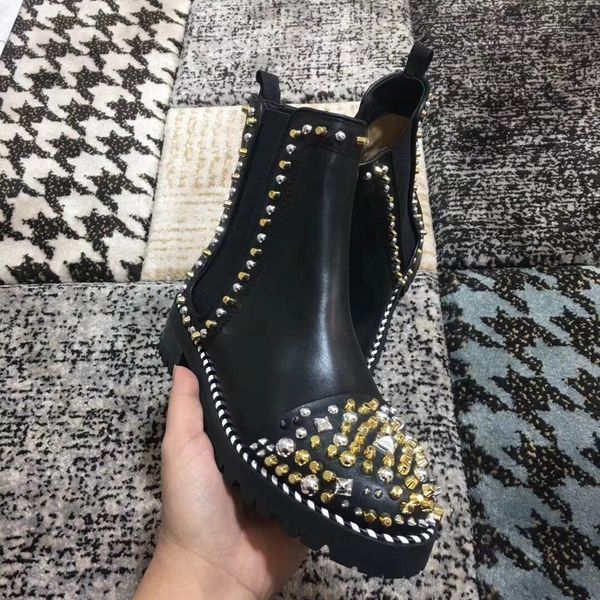 classic gold studs women's ankle boots black genuine leather fashion winter red bottom boots lady red sole boot
classic gold studs women's ankle boots black genuine leather fashion winter red bottom boots lady red sole boot