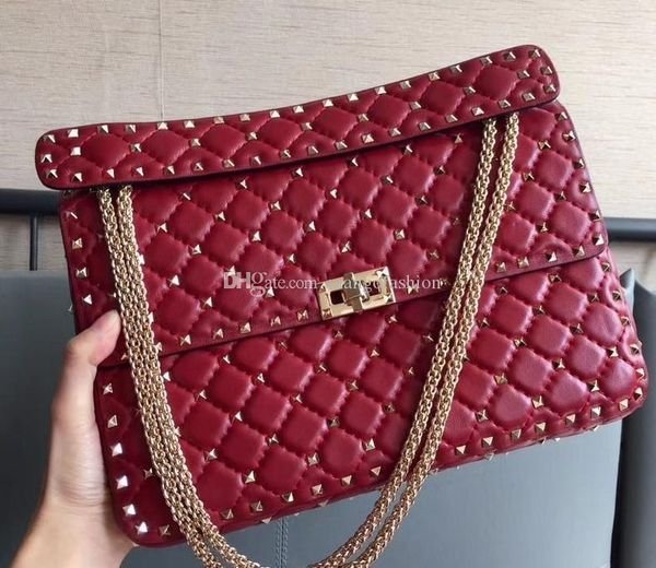 sell style imported first layer lambskin genuine leather eighteen color 30cm with light gold rivet women cross shoulder bag
sell style imported first layer lambskin genuine leather eighteen color 30cm with light gold rivet women cross shoulder bag