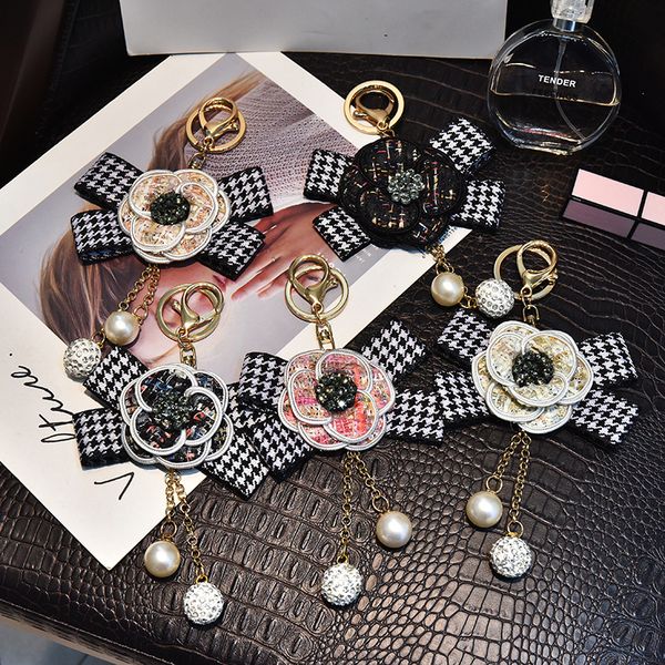 korea women cute handmade black white camellia flower tassel bag keychain for girl fashion car pendant ornament accessories, Silver
korea women cute handmade black white camellia flower tassel bag keychain for girl fashion car pendant ornament accessories, Silver