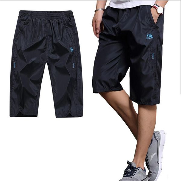summer mens shorts with pockets zipper bodybuilding clothing solid color sporting quick dry short men loose shorts working wear, White;black
summer mens shorts with pockets zipper bodybuilding clothing solid color sporting quick dry short men loose shorts working wear, White;black