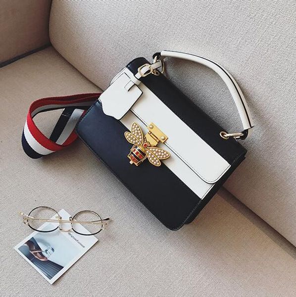 european and american fashion color small square bauble summer new handbag female inserts the bee lock shoulder bag
european and american fashion color small square bauble summer new handbag female inserts the bee lock shoulder bag