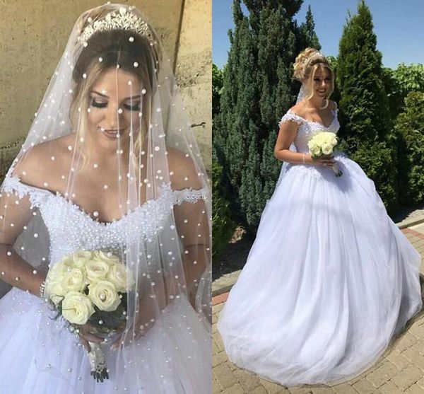 luxury design white pearls wedding dress with veil off shoulder ball gown gorgeous beading tulle bridal gowns corset back
luxury design white pearls wedding dress with veil off shoulder ball gown gorgeous beading tulle bridal gowns corset back