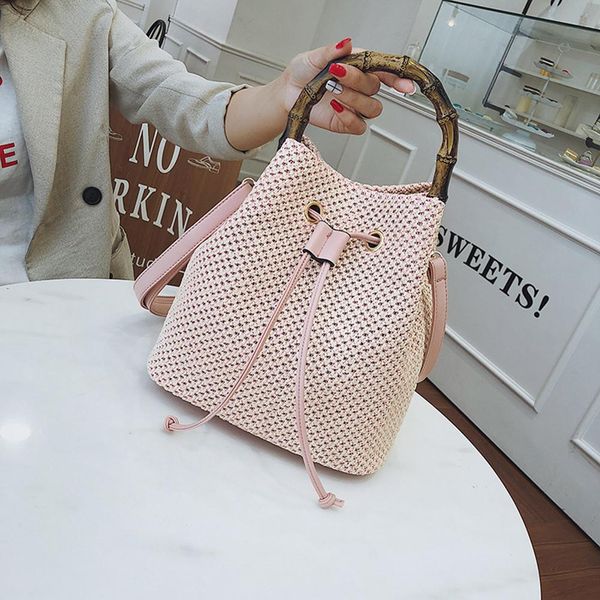 fashion bamboo handbag tote bucket shape hand weaving woven beach summer lady crossbody messenger bags women straw shoulder bag
fashion bamboo handbag tote bucket shape hand weaving woven beach summer lady crossbody messenger bags women straw shoulder bag