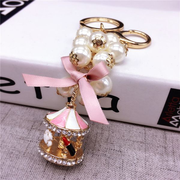 korean trendy merry-go-round pearl keychain jewelry for women bag car accessory, Golden;white
korean trendy merry-go-round pearl keychain jewelry for women bag car accessory, Golden;white