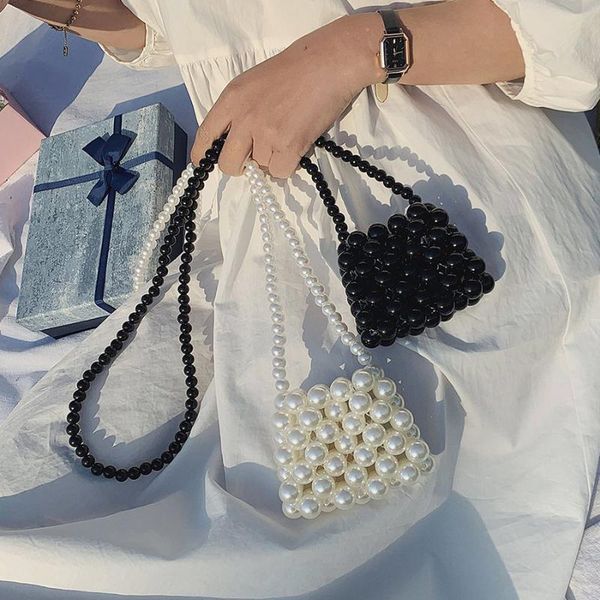 fashion hand-woven mini pearl bags lady beaded shoulder bag women party handbag small black pearl messenger cross body bag 2020 
fashion hand-woven mini pearl bags lady beaded shoulder bag women party handbag small black pearl messenger cross body bag 2020