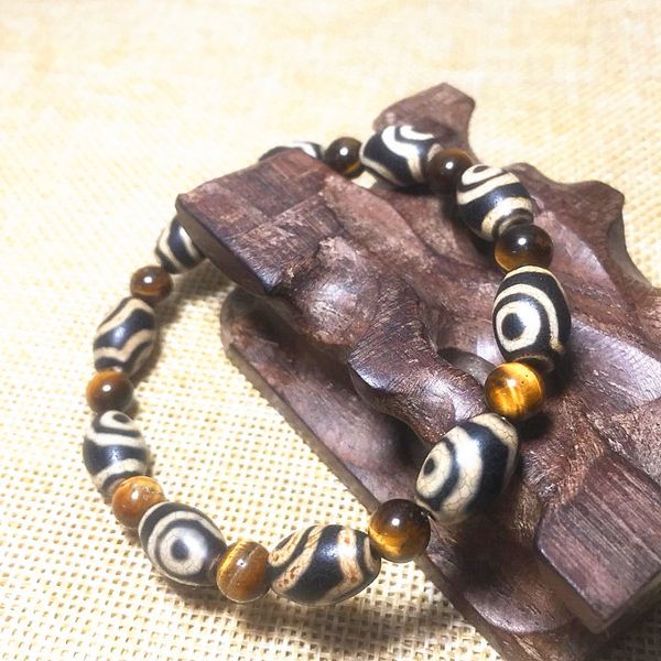 tibetan feng shui dzi 8*12mm 2 eyes rice-shaped beads 6mm tiger eyes stone string men and women jewelry bracelet ing, Black
tibetan feng shui dzi 8*12mm 2 eyes rice-shaped beads 6mm tiger eyes stone string men and women jewelry bracelet ing, Black