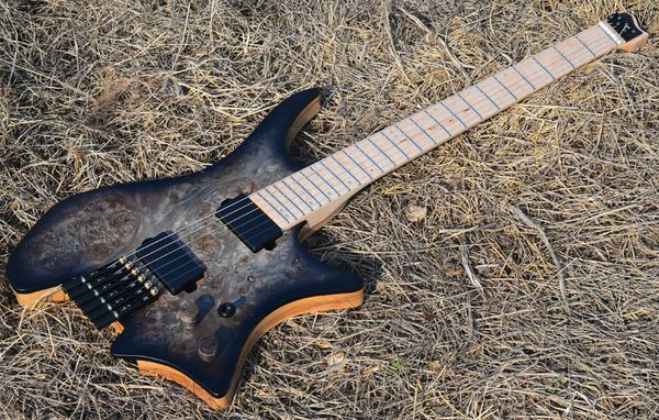 Factory cu tom headle model electric guitar black guitar flame maple neck cu tom color label
Factory cu tom headle model electric guitar black guitar flame maple neck cu tom color label