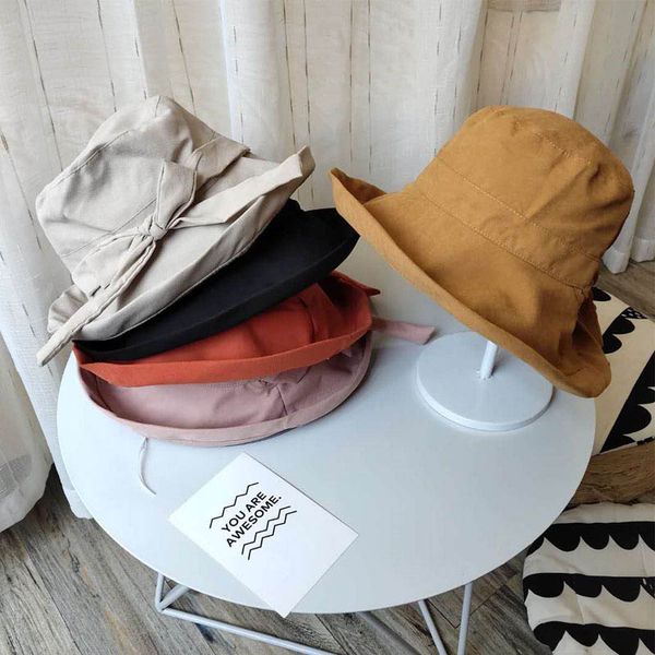 korean wide beech wooden ear summer sun hat female cute bow beach hat fashion wild fisherman folding girls bucket, Blue;gray
korean wide beech wooden ear summer sun hat female cute bow beach hat fashion wild fisherman folding girls bucket, Blue;gray
