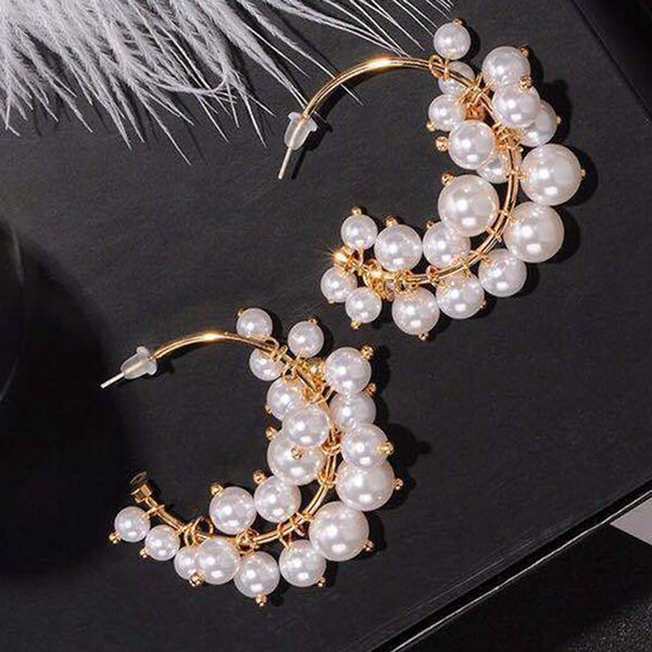 темперамент жемчужные серьги с-образный серьги творческий висит, Golden;silver
темперамент жемчужные серьги с-образный серьги творческий висит, Golden;silver