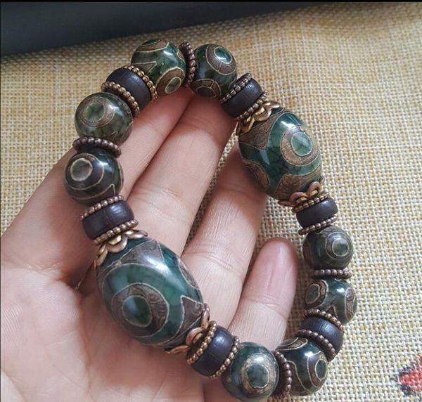 new designer sells luxurious high-quality three-eyed pearl agate chalcedony bracelet hip-hop retro tibetan style men and women's bracel, Black
new designer sells luxurious high-quality three-eyed pearl agate chalcedony bracelet hip-hop retro tibetan style men and women's bracel, Black
