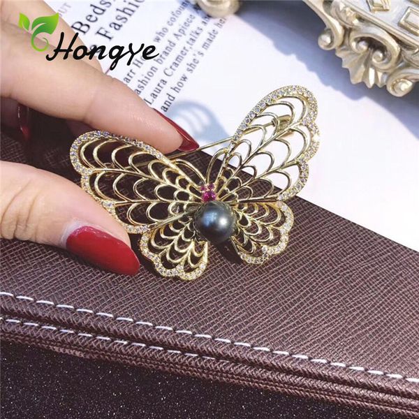 hongye silver/gold hollow out butterfly brooch pin natural black pearl beautiful animal brooches for women quality pearl brooch, Slivery;golden
hongye silver/gold hollow out butterfly brooch pin natural black pearl beautiful animal brooches for women quality pearl brooch, Slivery;golden