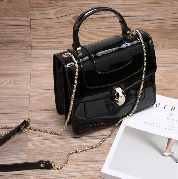 fashion designer women's patent leather enamel snake head bag chain strip one shoulder casual leather bag
fashion designer women's patent leather enamel snake head bag chain strip one shoulder casual leather bag