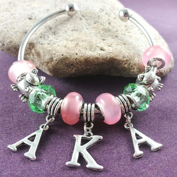 new pink and green bead aka frog charm bangle sorority fraternity jewelry drop shipping, Black
new pink and green bead aka frog charm bangle sorority fraternity jewelry drop shipping, Black