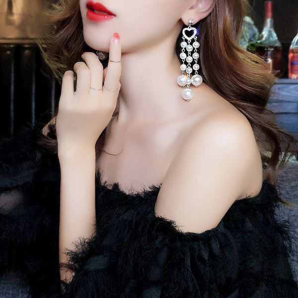s925 silver needle hypoallergenic long love earrings pearl tassel temperament wild earrings smart
s925 silver needle hypoallergenic long love earrings pearl tassel temperament wild earrings smart