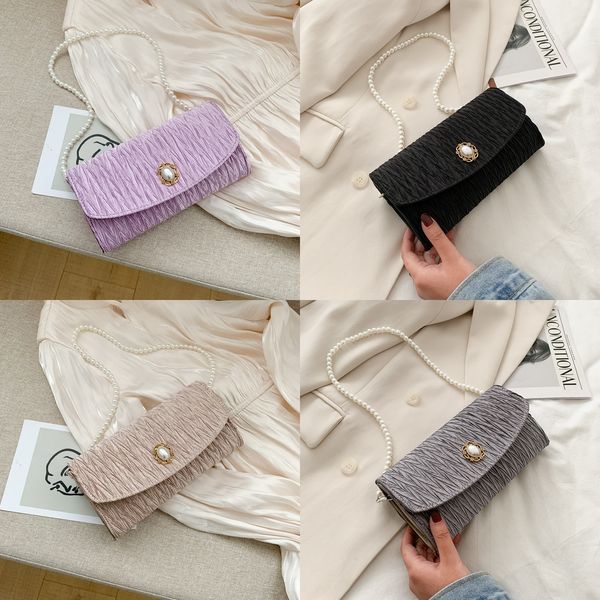 female 2020 pearl chain pearl small bag single shoulder messenger portable dinner small bag
female 2020 pearl chain pearl small bag single shoulder messenger portable dinner small bag