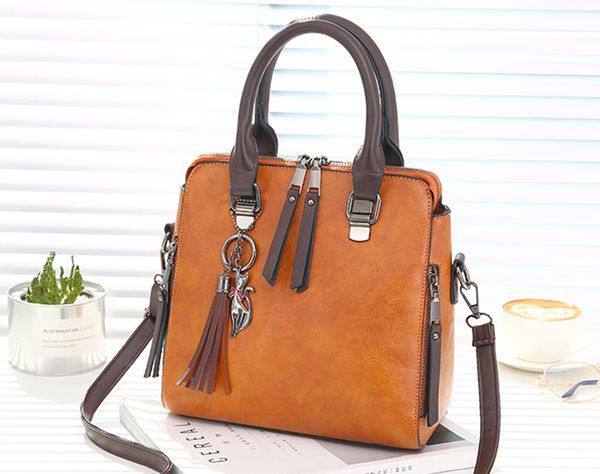 vintage pu leather ladies handbags women messenger bags totestassel designer crossbody shoulder bag boston hand bags sale 
vintage pu leather ladies handbags women messenger bags totestassel designer crossbody shoulder bag boston hand bags sale