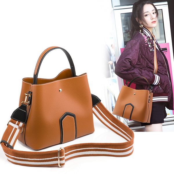 women's bag 2020 new bucket bag single shoulder women's wide shoulder slant span large capacity portable leather
women's bag 2020 new bucket bag single shoulder women's wide shoulder slant span large capacity portable leather