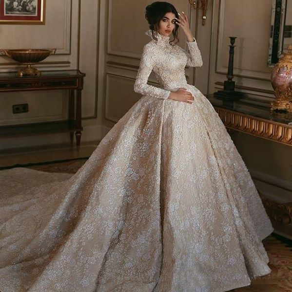 2019 Luxury High Neck Champagne Middle East Wedding Dresses White Lace Appliqued Long Sleeves Arabic Bridal Gowns Court Train Wedding Gowns
2019 Luxury High Neck Champagne Middle East Wedding Dresses White Lace Appliqued Long Sleeves Arabic Bridal Gowns Court Train Wedding Gowns