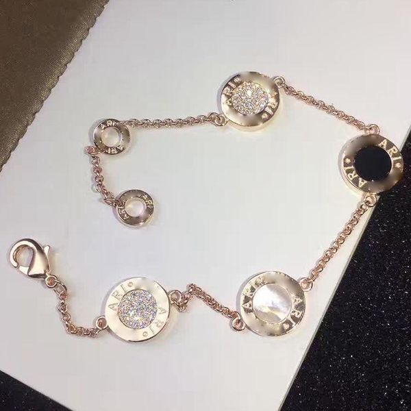 2020 designer accessories wholesale four round brand black and white shell double faced diamond bracelet brass plated
2020 designer accessories wholesale four round brand black and white shell double faced diamond bracelet brass plated