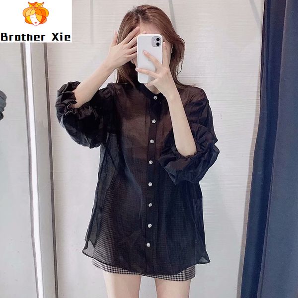 solid black women shirt chic beading buttons three quarter sleeve ladies blouse see through female shirt transparent blouse, White
solid black women shirt chic beading buttons three quarter sleeve ladies blouse see through female shirt transparent blouse, White