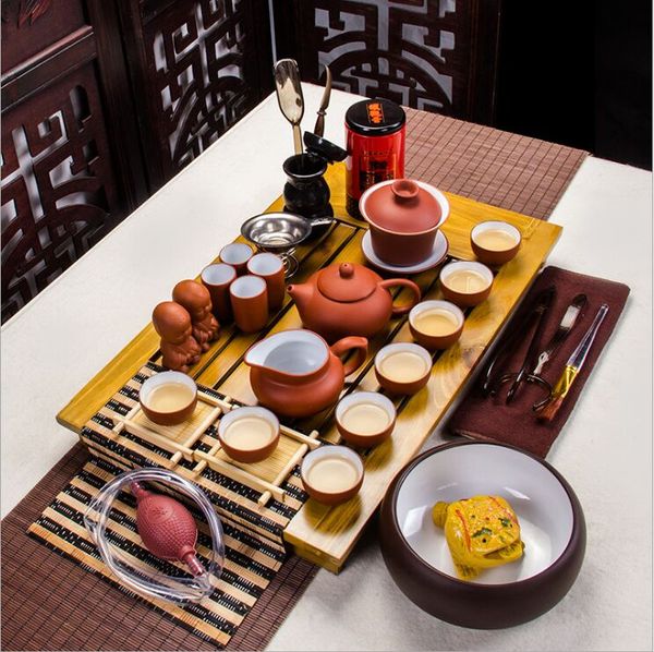 tea set red sand blue and white porcelain ice split solid wood doctor tea tray tea washing the whole set of kungfu
tea set red sand blue and white porcelain ice split solid wood doctor tea tray tea washing the whole set of kungfu