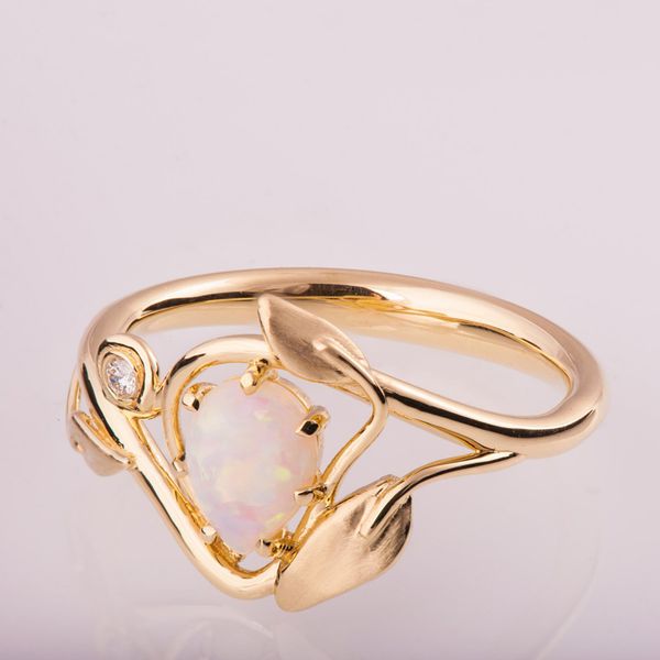 2019 new inlaid artificial opal rings for women european gold color branch leaves female rings wholesale dropship jewelry anel, Golden;silver
2019 new inlaid artificial opal rings for women european gold color branch leaves female rings wholesale dropship jewelry anel, Golden;silver