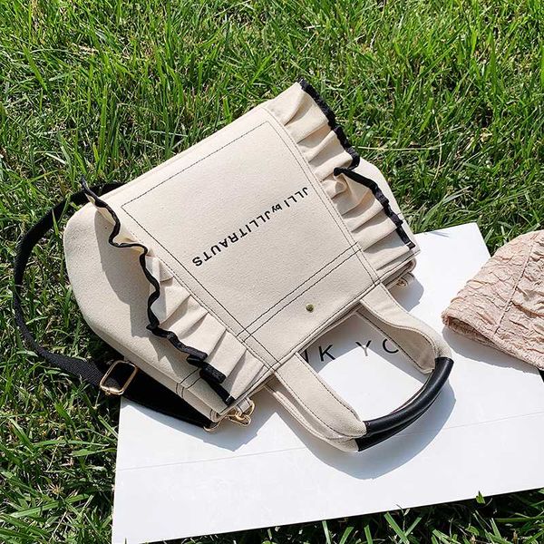 original design fashion canvas handbag elegant large-capacity shoulder bag messenger bag width 33cm height 26cm thickness 15cm
original design fashion canvas handbag elegant large-capacity shoulder bag messenger bag width 33cm height 26cm thickness 15cm
