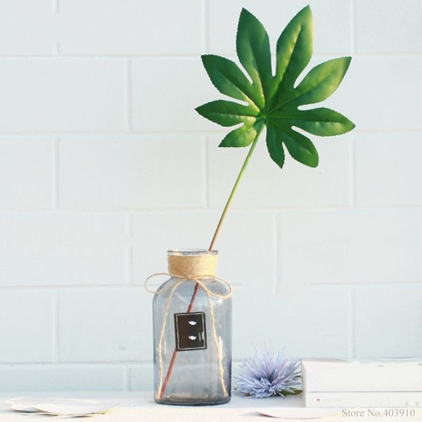 1pcs large palm tree local landscape artificial monstera leaf green plant decorative flower for table decoration tropical leaves
1pcs large palm tree local landscape artificial monstera leaf green plant decorative flower for table decoration tropical leaves