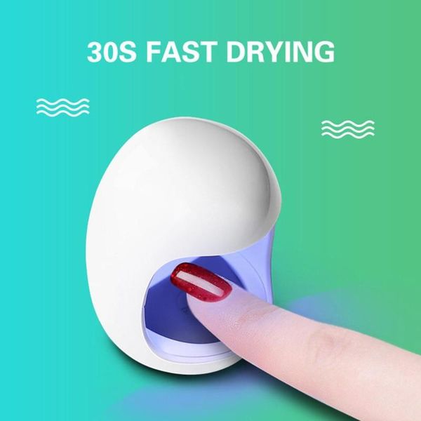 mini professional nail art lamp ногтей сушилка led уф лампы гель лак осушитель ультрафиолетовый свет лампы
mini professional nail art lamp ногтей сушилка led уф лампы гель лак осушитель ультрафиолетовый свет лампы