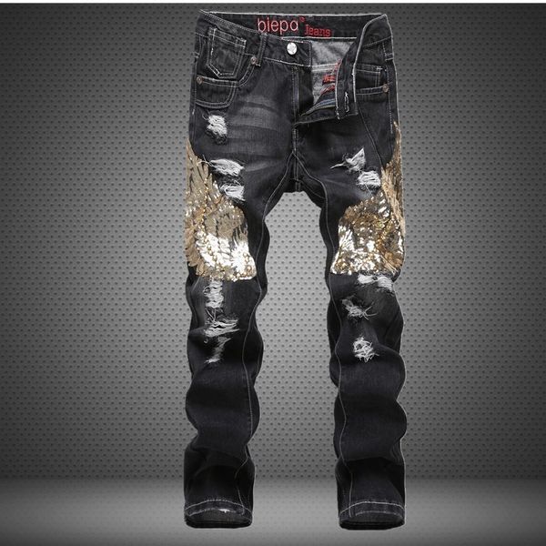 new brand men jeans blue and black ripped and eagle wings of embroidery movie stars same style men jeans 588
new brand men jeans blue and black ripped and eagle wings of embroidery movie stars same style men jeans 588