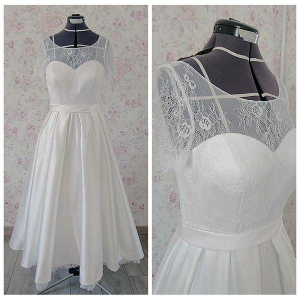 classic design lace applique simple wedding dress sheer neck a line wedding dress with covered button floor length beach wedding dress, White
classic design lace applique simple wedding dress sheer neck a line wedding dress with covered button floor length beach wedding dress, White