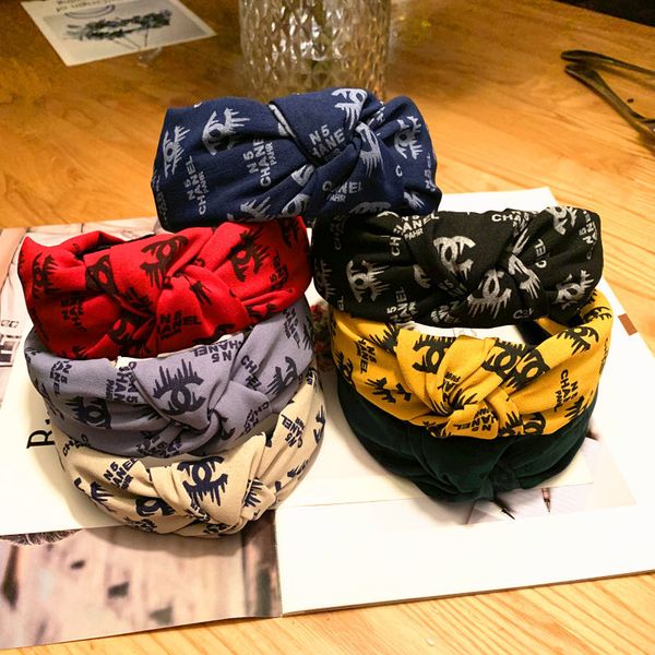 

Fa hion headband girl vintage knitting twi ted knotted letter headband wide hair band head wear acce orie 7 color