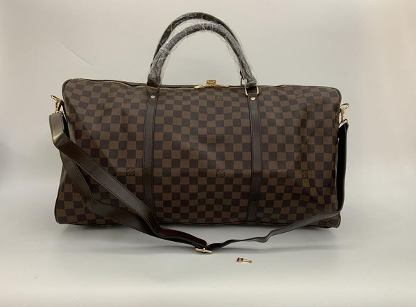 2020 men duffle bag women travel bags hand luggage luxury designer travel bag men pu leather handbags large cross body bag totes 54cm
2020 men duffle bag women travel bags hand luggage luxury designer travel bag men pu leather handbags large cross body bag totes 54cm