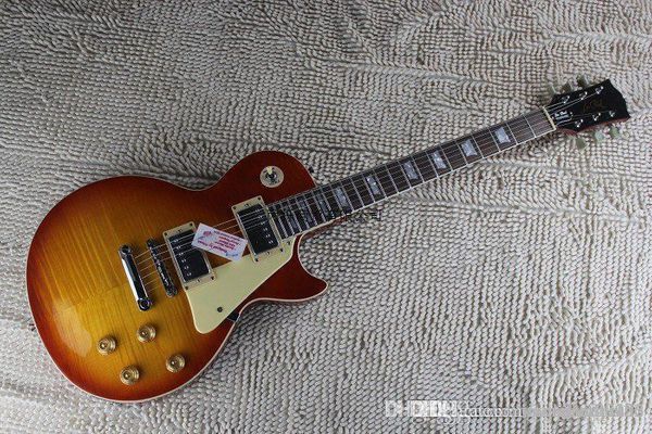 бесплатная доставка 2014 высокого качества flame maple top g les standard brown lp гитара paul electric
бесплатная доставка 2014 высокого качества flame maple top g les standard brown lp гитара paul electric