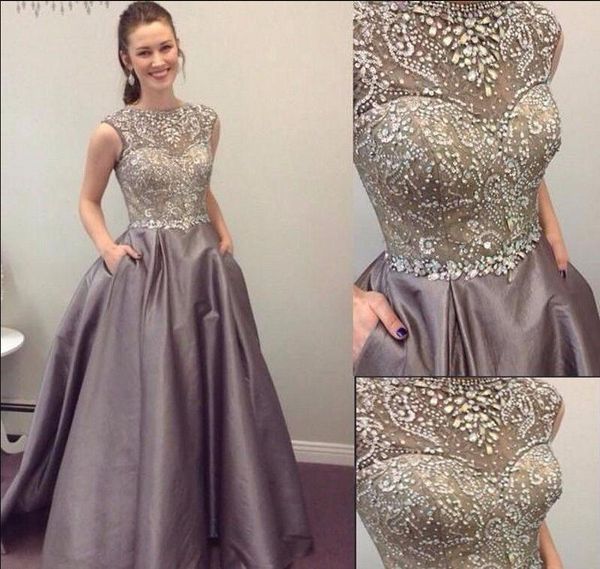 2020 silver satin prom dresses with pockets beading crystal grey formal evening gowns with jewel neck sleeveless floor length dress gown, Black
2020 silver satin prom dresses with pockets beading crystal grey formal evening gowns with jewel neck sleeveless floor length dress gown, Black