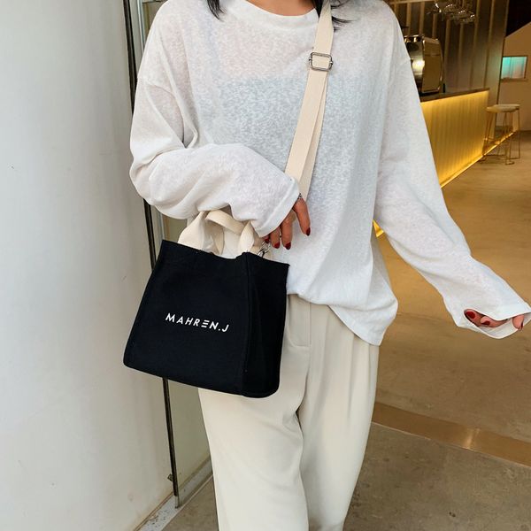 simple contrasting color lettered canvas bag womens bag new 2020 xiasen stitching handbag wide shoulder strap messenger bag
simple contrasting color lettered canvas bag womens bag new 2020 xiasen stitching handbag wide shoulder strap messenger bag