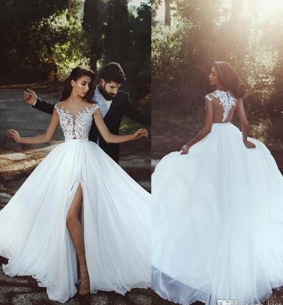 a-line boho кружева свадебные платья 2020 vestido de noiva суд поезд высокий сплит cap рукавом шифон тюль sheer свадебные платья w1035, White
a-line boho кружева свадебные платья 2020 vestido de noiva суд поезд высокий сплит cap рукавом шифон тюль sheer свадебные платья w1035, White