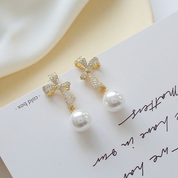 korean pure silver needle bow pearl advanced sense small group elegant long earrings temperament earrings female stud, Golden;silver
korean pure silver needle bow pearl advanced sense small group elegant long earrings temperament earrings female stud, Golden;silver