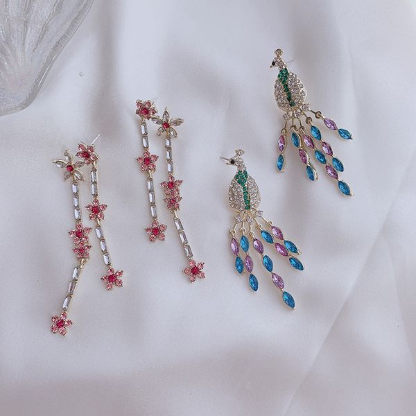 korean exquisite shiny colorful rhinestones flowers peacock shape earrings temperament ladies dinner accessories jewelry, Silver
korean exquisite shiny colorful rhinestones flowers peacock shape earrings temperament ladies dinner accessories jewelry, Silver