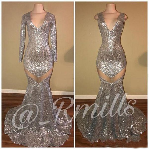 Silver Sequin Mermaid Prom Dresses 2019 African Glitz Reflective Party Gowns Long Sleeves V Neck Zipper Back Sexy Evening Gowns 
Silver Sequin Mermaid Prom Dresses 2019 African Glitz Reflective Party Gowns Long Sleeves V Neck Zipper Back Sexy Evening Gowns