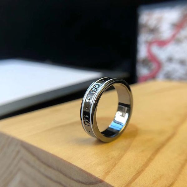 Роскошное качество черная полоса фирменное наименование панк кольцо штамп логот
Роскошное качество черная полоса фирменное наименование панк кольцо штамп логот