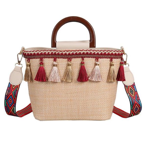 2020 new beach straw bag ethnic style ribbon tassel beach bag stitching contrast color female bag ing
2020 new beach straw bag ethnic style ribbon tassel beach bag stitching contrast color female bag ing