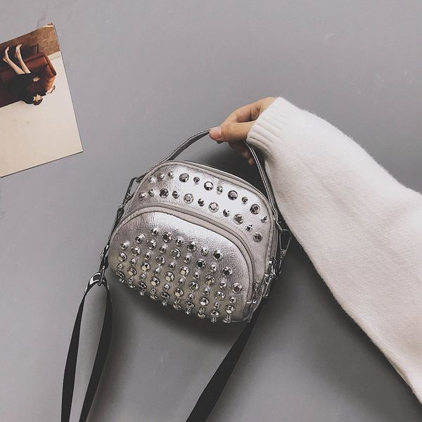 rivets handbags women bags women single shoulder message bag solid small ladies purses wide shoulder strap 
rivets handbags women bags women single shoulder message bag solid small ladies purses wide shoulder strap