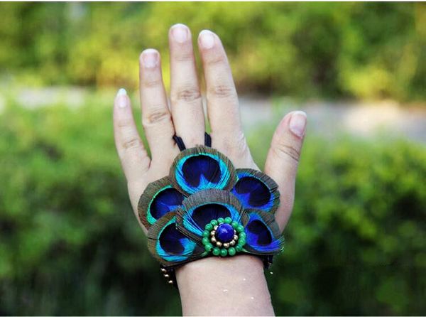 original wax rope weave peacock feather bracelet nation retro jewelry popular accessories wholesale classic stage show girl favorite gloves, Golden;silver 
original wax rope weave peacock feather bracelet nation retro jewelry popular accessories wholesale classic stage show girl favorite gloves, Golden;silver