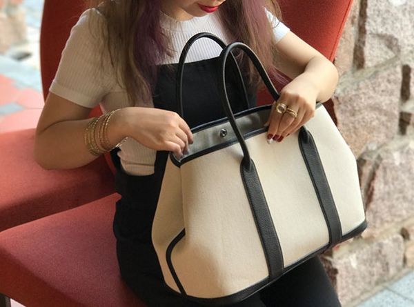 bag canvas and leather tote large capacity wide strap silver buckle women handbags
bag canvas and leather tote large capacity wide strap silver buckle women handbags