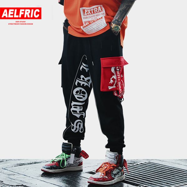 aelfric hip hop streetwear harem pants sweatpants reflective stripe ribbon joggers pants men spring casual letter print trousers, Black
aelfric hip hop streetwear harem pants sweatpants reflective stripe ribbon joggers pants men spring casual letter print trousers, Black