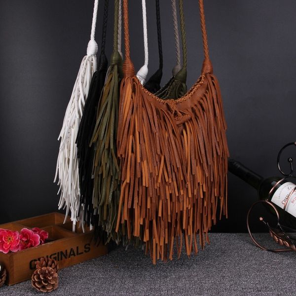 new european and american retro hand woven fringe bag leisure brown shoulder bag messenger
new european and american retro hand woven fringe bag leisure brown shoulder bag messenger