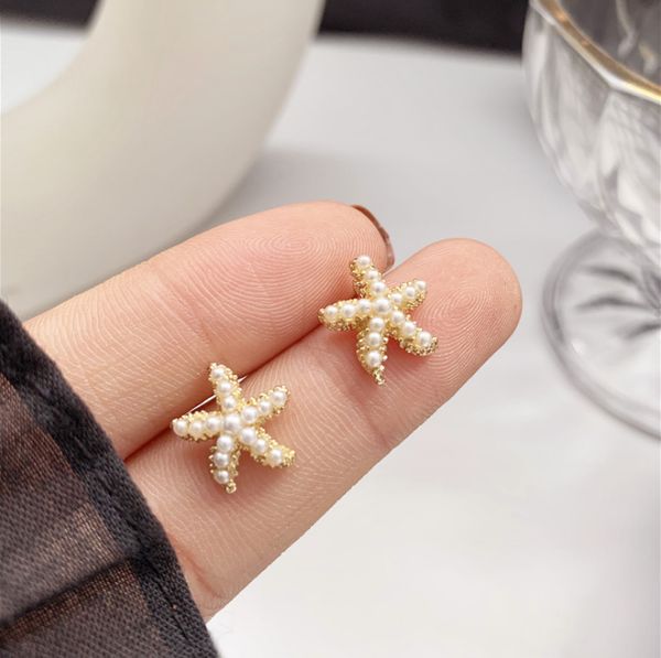 2020 new arrival s925 silver needle korean temperament fresh and compact starfish earrings pearl earrings female earrings ear clips
2020 new arrival s925 silver needle korean temperament fresh and compact starfish earrings pearl earrings female earrings ear clips